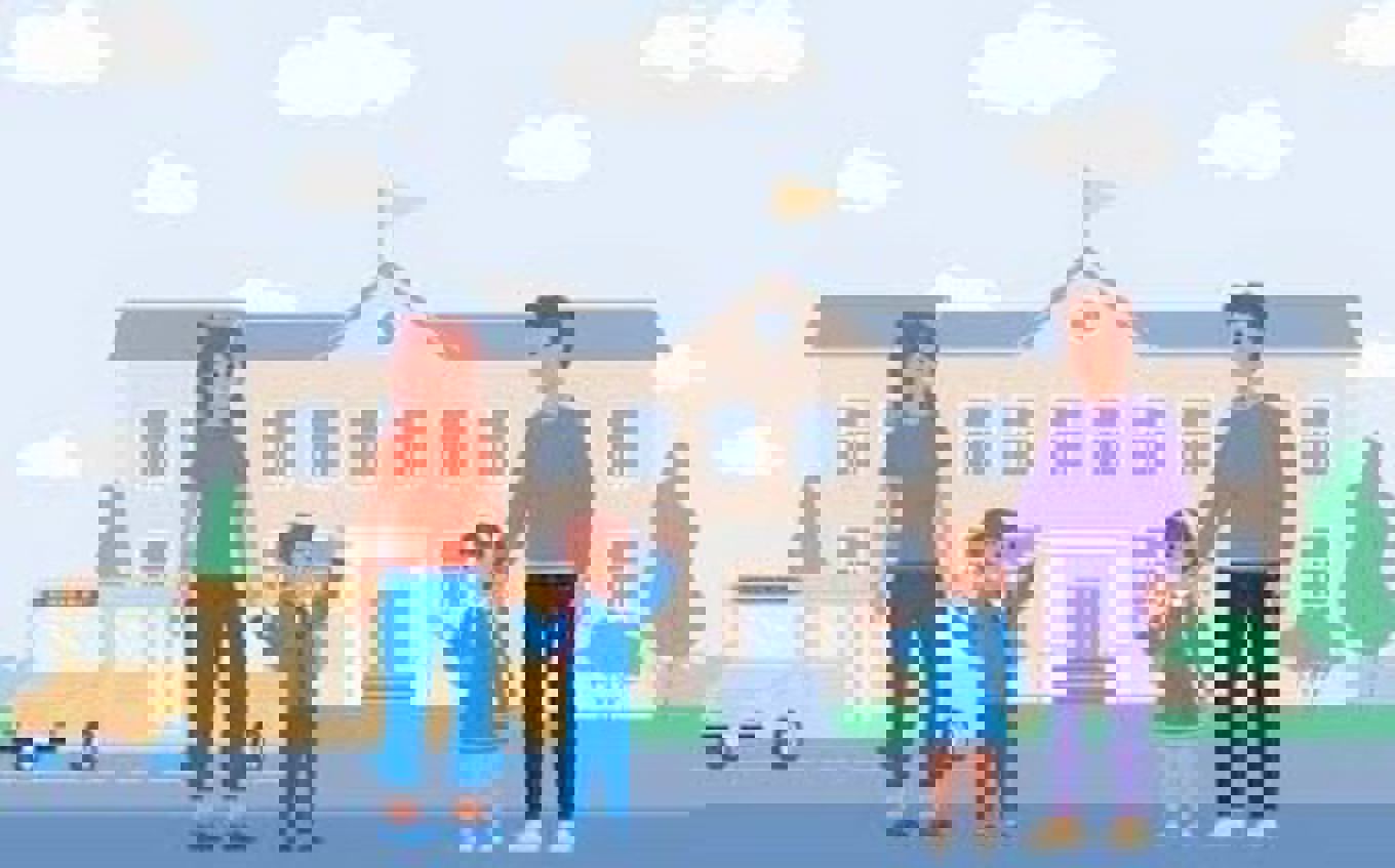 en familie som poserer foran et hus